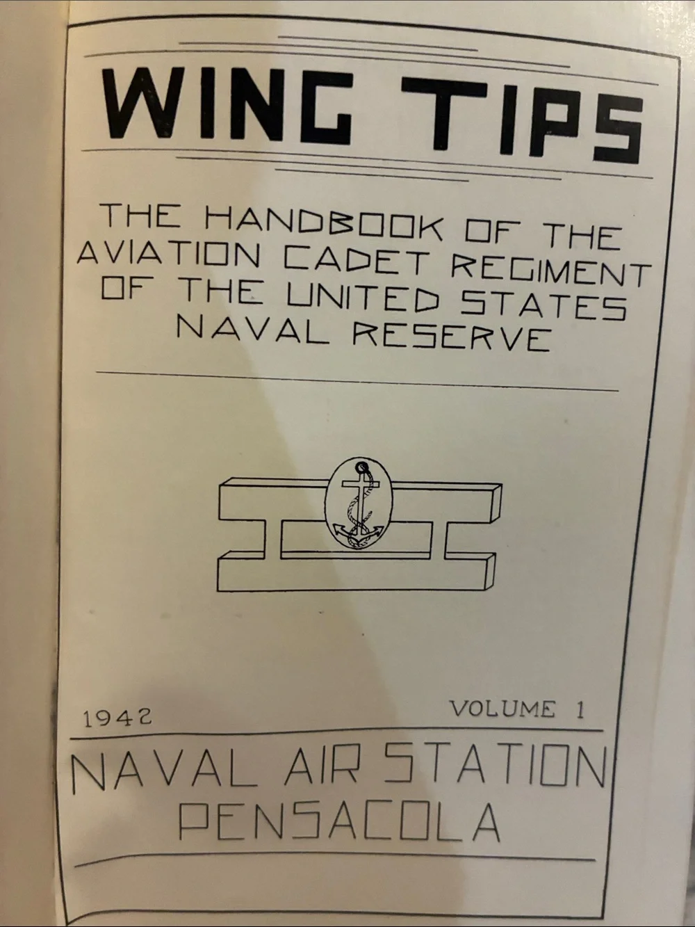 Wing Tips 1942 NAS Pensacola Hardcover in Navy Blue with Gold Emblem